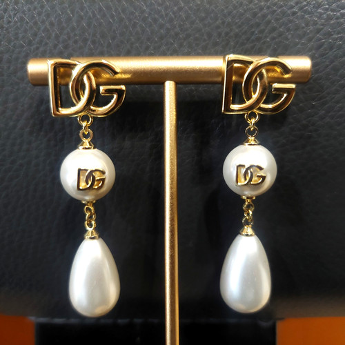 Dolce gabbana gold dg logo - &,